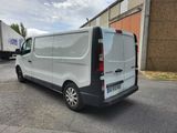 a white van that is parked in a parking lot