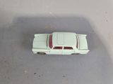 a toy car that is sitting on the floor
