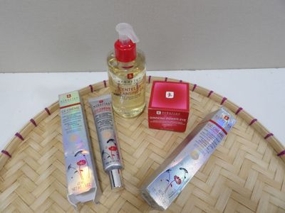 a bottle of lotion and a tube of lotion sitting on a tray