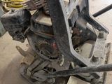 a machine that is sitting on the ground in the garage