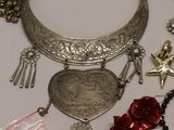 a table with a lot of jewelry on it