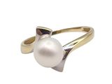 a close up of a pearl ring on a white background