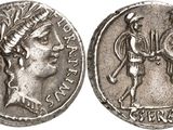 a silver coin with an image of a man holding a sword