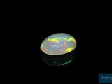 a white oplite in a black background