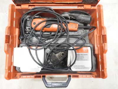 an orange tool box with tools in it on the floor