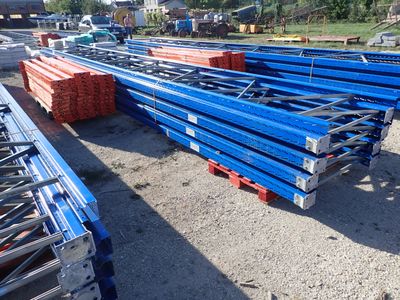 many different types of steel bars stacked on the ground