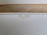 a close up of the inside of a white purse