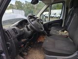 the interior of a van with a steering wheel and a steering wheel