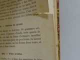 an open book that has a picture of a cat on it