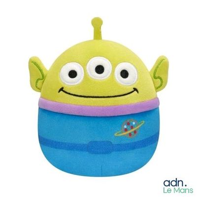 peluche Disney·Pixar posée sur une surface blanche