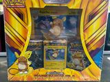 a box of pokemon cards sitting on top of a table