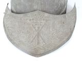 a close up of a helmet on a white surface