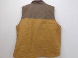 the back of a vest with a brown and tan color block on it