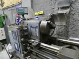 a machine that is working on a piece of metal