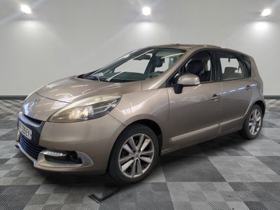 a picture of a car that is parked in a garage