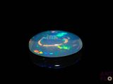 an image of a black oplite in the dark