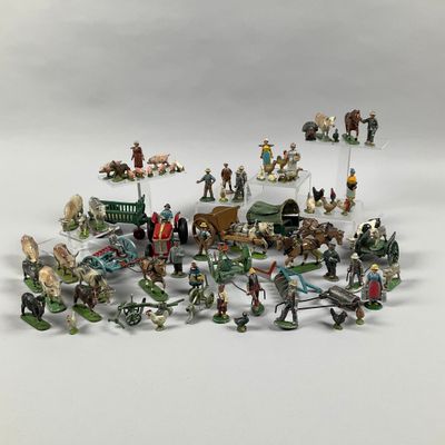 a lot of figurines that are sitting on a table