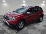the red dacia is parked in a room with a checkered floor