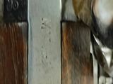 a close up of a metal object on a wooden table