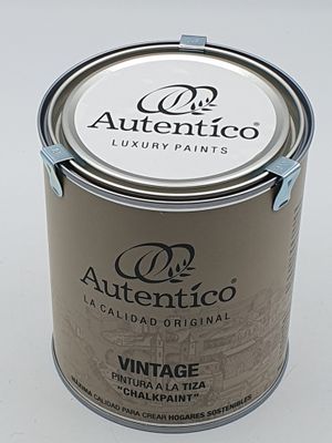 an image of a can of paint sitting on top of a table