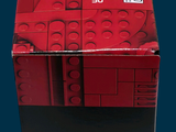 a red box that has a picture of a lego man on it