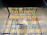 a box full of pokemon cards sitting on top of a table