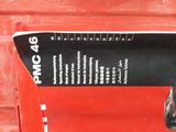 a red box with a black and white label on it