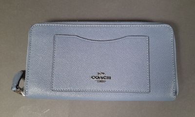 coach zip around wallet in light blue