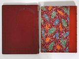 a red box with a pattern on it and a red box with a pattern on it