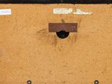 a piece of cardboard that has a hole in it