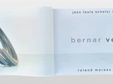 an open book with a picture of a ring on it