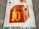 a sign that says exigor k on the side of a building
