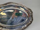 a man taking a picture of himself in a mirror