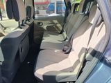 the back seats of a car are empty in the sun