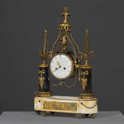 a clock that is sitting on top of a table