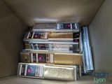 a box full of different types of cds in it
