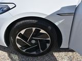 a close up of a white car with its door open