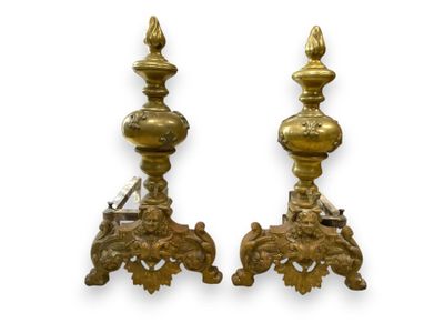 pair of antique brass candlesticks with ornate design