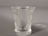 a clear glass cup sitting on a table