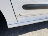 a close up of a car door handle and the door handle is missing