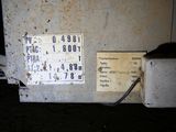 a picture of an old refrigerator with a thermometer on it