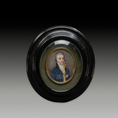 an oval miniature portrait of a gentleman in a blue coat
