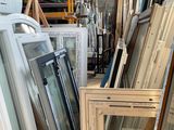 many different types of windows and doors in a warehouse