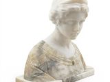 marble bust of a woman holding a tray of food on a white surface