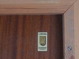 a picture of a wooden door with a sign on it