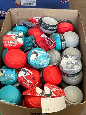 a cardboard box filled with various types of coffee