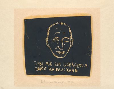 an image of a black and white drawing of a man ' s face on a piece of paper