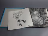an open book with a drawing of a man on a skateboard