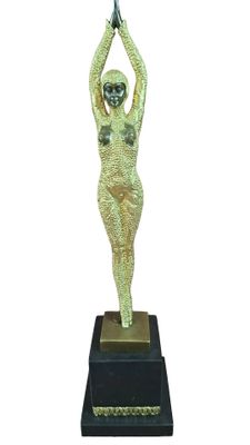 statue of a woman holding a tennis racquet on a black base