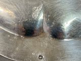 a close up of a metal object on a table